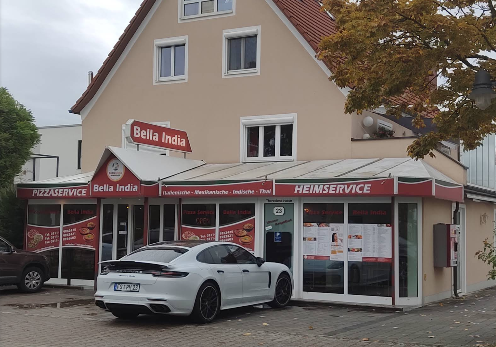 Restaurant Bella India mit Pizzaservice und Heimservice, präsentiert in einem modernen Gebäude.